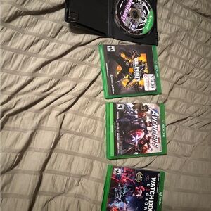 Four Xbox One Games. Watchdogs, Watchdogs 3, Avengers, and Black Ops 4